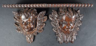 PAIR OF 19TH CENTURY CHERUB WALL BRACKETS