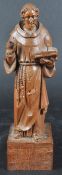 19TH CENTURY CARVED OAK FIGURINE DEPICTING SAINT FRANCIS