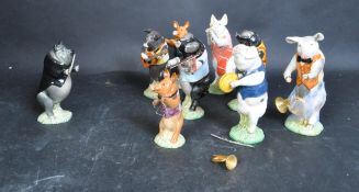 EIGHT BESWICK PIG PROM PORCELAIN FIGURINES