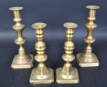 TWO PAIRS OF 19TH & 20TH CENTURY BRASS CANDLESTICKS