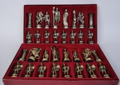 TWO BOXED SETS OF ROMAN SPELTER CHESS PIECES