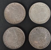 FOUR 19TH CENTURY AMERICAN SILVER MORGAN DOLLAR COINS