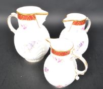 SET OF THREE COALPORT CAUGHLEY MASK GRADUATING VASES