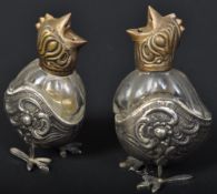 PAIR OF EARLY 20TH CENTURY SILVER PLATED COCKERAL CRUETS