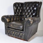 MID CENTURY GREEN LEATHER CHESTERFIELD STYLE ARMCHAIR