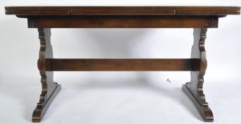 ERCOL OLD COLONIAL DINING TABLE WITH FLEUR DE LYS CHAIRS