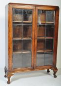 1920'S QUEEN ANNE REVIVAL OAK & LEADED GLASS BOOKCASE