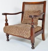 VINTAGE 20TH CENTURY LOW MAHOGANY RATTAN ARMCHAIR