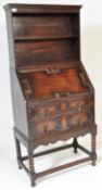 1920'S JACOBEAN REVIVAL OAK BUREAU BOOKCASE