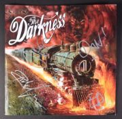 THE DARKNESS - FULL BAND AUTOGRAPHED TOUR PROGRAMME