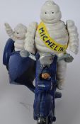 CAST IRON MICHELIN MEN ON MOTORCYCLES
