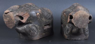 PAIR OF EARLY 20TH CENTURY CARVED INDIAN ELEPHANT HEADS