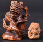 TWO JAPANESE HAND CARVED DRAGON NETSUKES