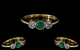 18ct Gold - Superb Quality 3 Stone Diamond and Emerald Set Dress Ring. Rub-over Setting.