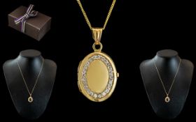 Ladies 9ct Gold Diamond Set Hinged Locket of oval form with attached 9ct gold chain,