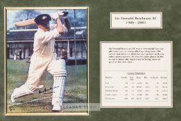 Sir Don Bradman signed colour photograph display The image portraying a front foot drive in the nets