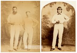 An early photographic portrait of cricketers W G Grace and Henry Jupp, circa 1870s. The two