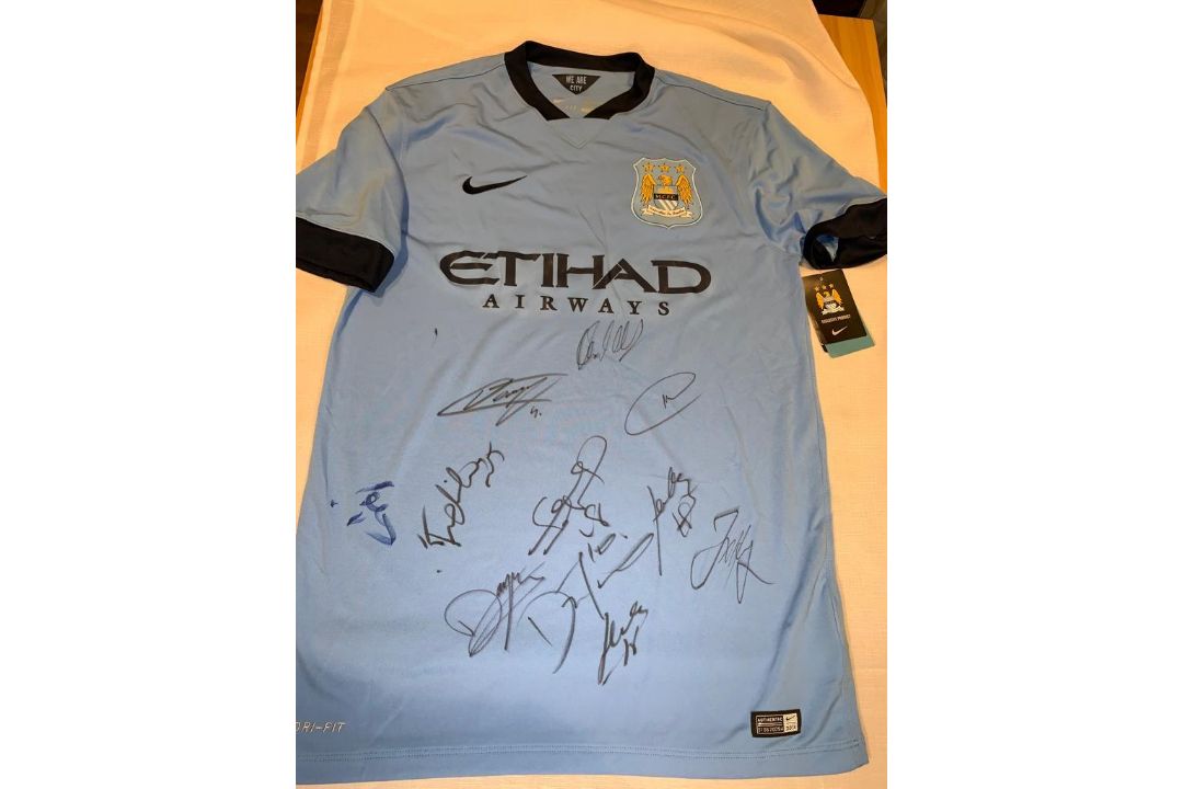 Team-signed blue Manchester City replica jersey 2014-15, Nike, short-sleeved with club crest and - Image 1 of 2