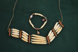An African bone and turquoise choker etc.