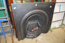 A cast iron fireplace.