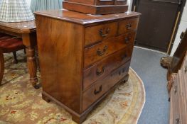 A George III mahogany chest of drawers.