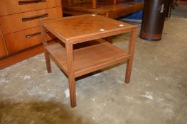 A Mackintosh two tier coffee table.