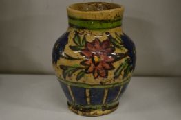 A small Islamic style pottery vase.