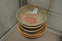 Five Chinese terracotta bowls.