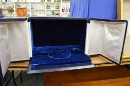 A Garrard & Co blue leather case.