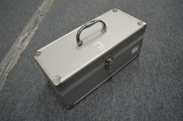 An aluminium vanity box.