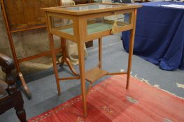 An inlaid mahogany bijouterie table.