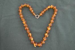 An amber style bead necklace.