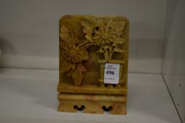 A Chinese carved soapstone plaque.