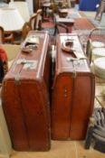 Two leather suitcases.