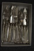 A set of twelve fish knives and forks.