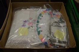 A quantity of embroidered and other table linen.