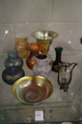 Art Nouveau and later iridescent glassware to include a trumpet shaped vase, a circular dish, an