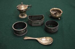 Silver napkin rings, a caddy spoon etc.