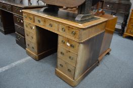 A Victorian mahogany twin pedestal desk.