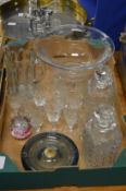 A large glass bowl, whisky decanters etc.