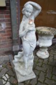 A classical garden figure.