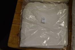 Twelve white napkins.