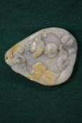 A Chinese carved hardstone pendant.