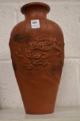 An unusual Chinese terracotta vase.