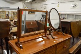 Two mahogany dressing table mirrors.