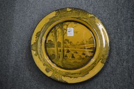 A Royal Doulton plate depicting a landscape.