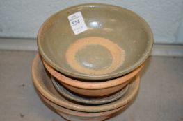 Five Chinese terracotta bowls.