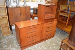 A G-Plan eight drawer chest and matching bedside table.