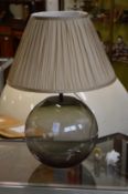 A glass table lamp.