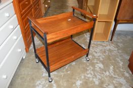A teak two tier trolley.